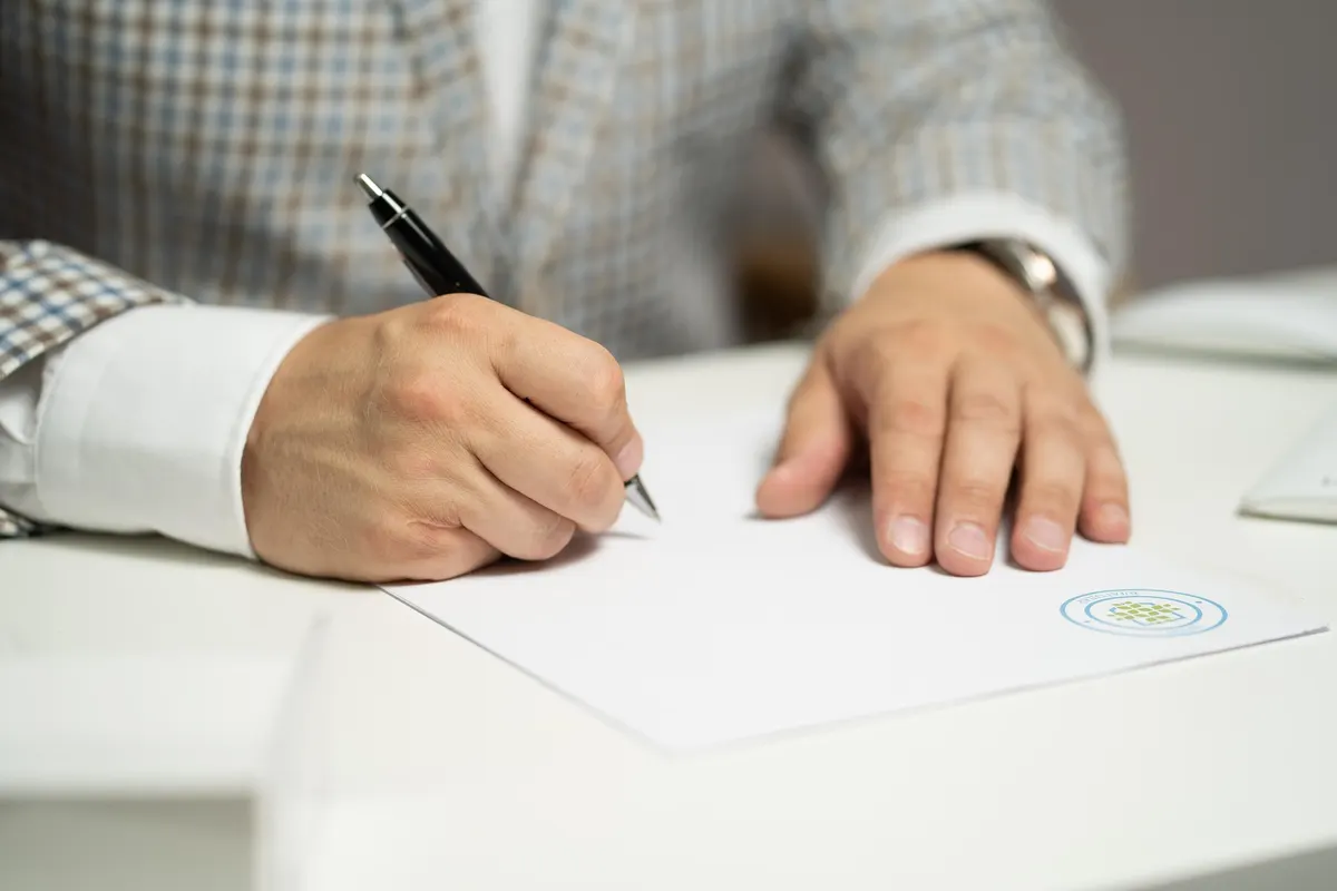 Professional signing a document
